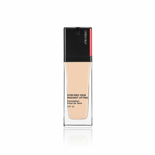 Base per Trucco Fluida Shiseido Skin Radiant Lifting Nº 130 Opal Spf 30 30 ml